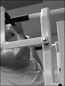 Weighted chin ups on the Nautilus Omni Multi-Exercise