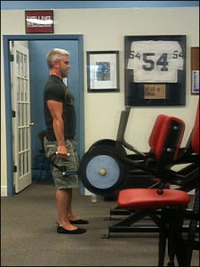 Drew Baye performing stiff-leg deadlifts during a negative emphasized workout