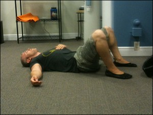 Drew Baye on the floor after a high intensity training workout