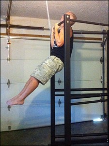 Drew Baye performing chin ups on the UXS