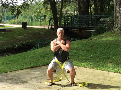 Drew Baye demonstrating a TSC belt squat